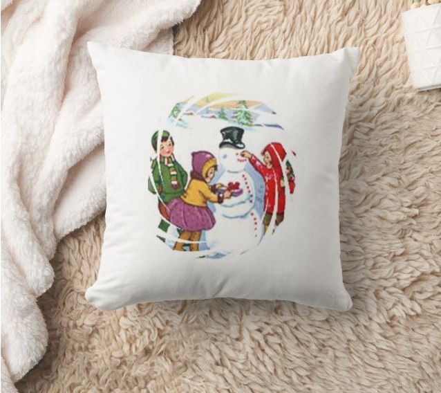 vintage style Christmas throw pillow featuring a snowman and three children adding the finishing touches to him